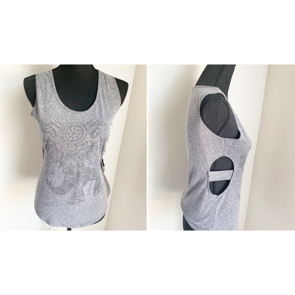 Guess retro elephant tank with Side cut outs.